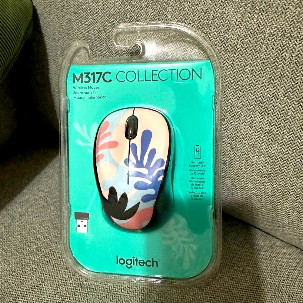 Logitech M317C Mouse - coral reef